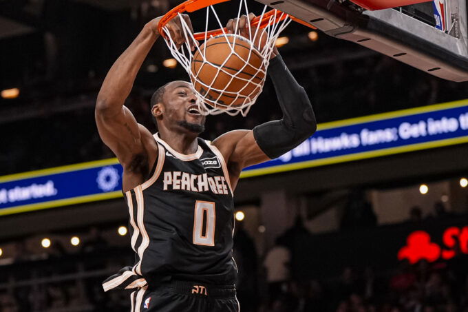 Feb 26, 2026; Atlanta, Georgia, USA; Atlanta Hawks forward Jonathan Kuminga (0) dunks against the Washington Wizards during the second half at State Farm Arena. Mandatory Credit: Dale Zanine-Imagn Images