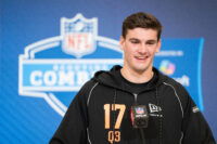 Feb 27, 2026; Indianapolis, IN, USA; Alabama quarterback Ty Simpson (QB17) speaks to members of the media during the NFL Combine at the Indiana Convention Center. Mandatory Credit: