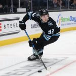 Mar 1, 2026; Salt Lake City, Utah, USA; Utah Mammoth center Logan Cooley (92) skates with the puck against the Chicago Blackhawks during the second period at Delta Center. Mandatory Credit: Rob Gray-Imagn Images