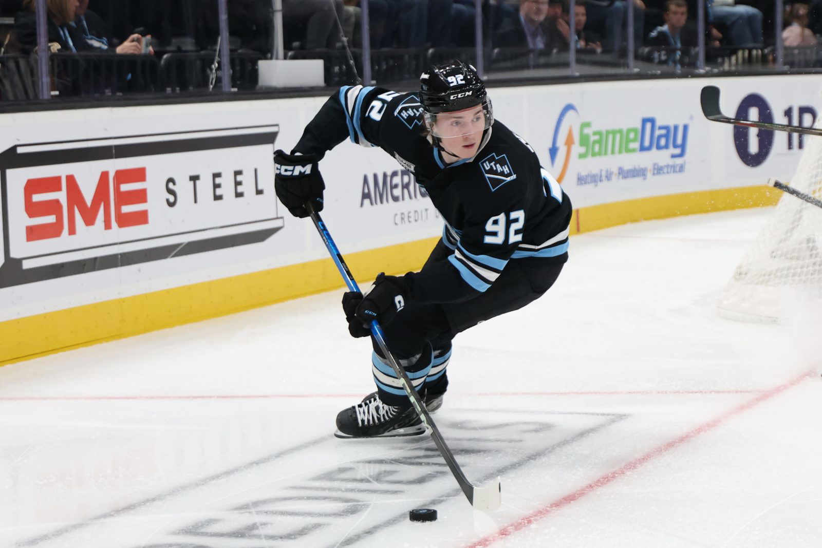 Mar 1, 2026; Salt Lake City, Utah, USA; Utah Mammoth center Logan Cooley (92) skates with the puck against the Chicago Blackhawks during the second period at Delta Center. Mandatory Credit: Rob Gray-Imagn Images