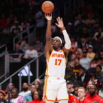 Mar 1, 2026; Atlanta, Georgia, USA; Atlanta Hawks forward Onyeka Okongwu (17) shoots against the Portland Trail Blazers in the fourth quarter at State Farm Arena. Mandatory Credit: Brett Davis-Imagn Images
