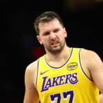 Feb 26, 2026; Phoenix, Arizona, USA; Los Angeles Lakers guard Luka Doncic (77) against the Phoenix Suns at Mortgage Matchup Center. Mandatory Credit: Mark J. Rebilas-Imagn Images