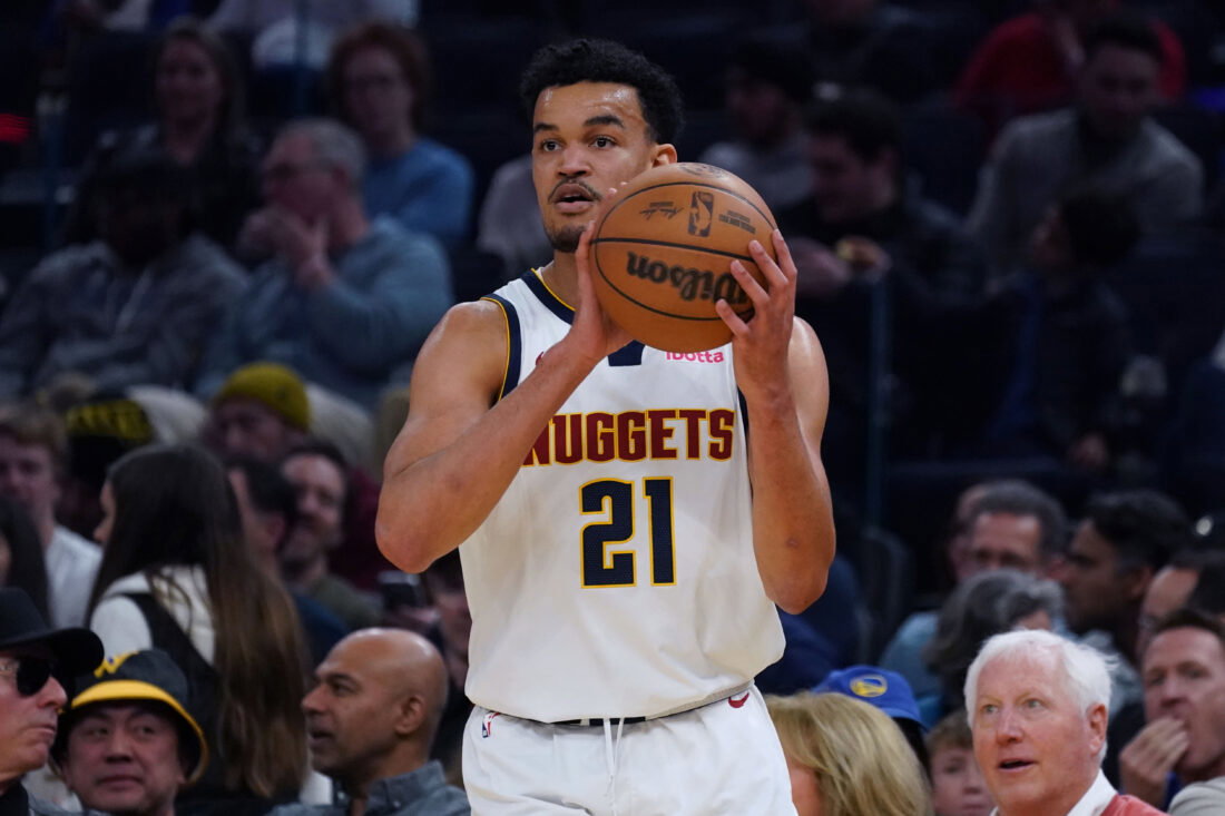 Feb 22, 2026; San Francisco, California, USA; Denver Nuggets forward Spencer Jones (21) looks to pass in the second quarter against the Golden State Warriors at Chase Center.
