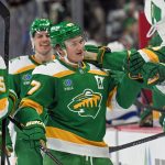 Mar 3, 2026; Saint Paul, Minnesota, USA; Minnesota Wild forward Kirill Kaprizov (97) is congratulated by teammates after taking sole possession as the franchise leader in goals on an empty netter against the Tampa Bay Lightning during the third period at Grand Casino Arena. Mandatory Credit: Nick Wosika-Imagn Images