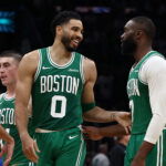 Mar 6, 2026; Boston, Massachusetts, USA; Boston Celtics forward Jayson Tatum (0) has a laugh with guard Jaylen Brown (7) during the second half against the Dallas Mavericks at TD Garden. Mandatory Credit: