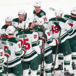 Mar 6, 2026; Las Vegas, Nevada, USA; Minnesota Wild players celebrate after the Wild defeated the Vegas Golden Knights 4-2 at T-Mobile Arena. Mandatory Credit: Stephen R. Sylvanie-Imagn Images