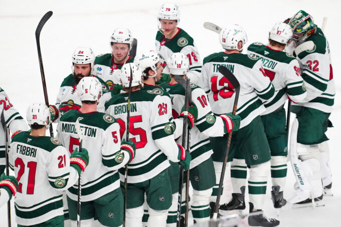 Mar 6, 2026; Las Vegas, Nevada, USA; Minnesota Wild players celebrate after the Wild defeated the Vegas Golden Knights 4-2 at T-Mobile Arena. Mandatory Credit: Stephen R. Sylvanie-Imagn Images