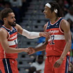 Mar 8, 2026; New Orleans, Louisiana, USA; Washington Wizards guard Trae Young (3) celebrates with guard Tre Johnson (12) during the first half against the New Orleans Pelicans at Smoothie King Center. Mandatory Credit: Matthew Hinton-Imagn Images