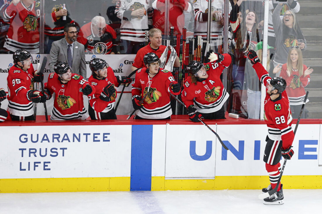 Mar 9, 2026; Chicago, Illinois, USA; Chicago Blackhawks left wing Andre Burakovsky (28) celebrates with teammates after scoring against the Utah Mammoth during the second period at United Center. Mandatory Credit: Kamil Krzaczynski-Imagn Images