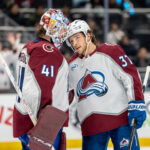 Mar 12, 2026; Seattle, Washington, USA; Colorado Avalanche goalie Scott Wedgewood (41), left, and Colorado Avalanche defenseman Brett Kulak (27) celebrate after a game against the Seattle Kraken at Climate Pledge Arena. Mandatory Credit: Stephen Brashear-Imagn Images