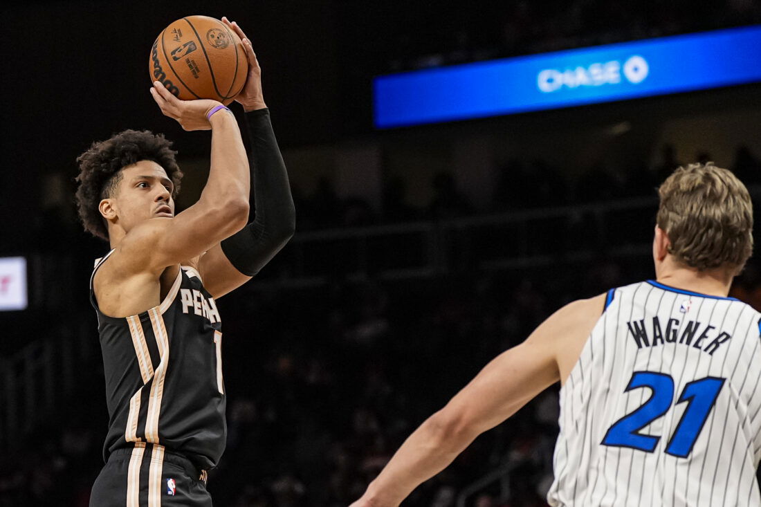 Mar 16, 2026; Atlanta, Georgia, USA; Atlanta Hawks forward Jalen Johnson (1) shoots over Orlando Magic forward Moritz Wagner (21) during the second half at State Farm Arena.