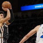 Mar 16, 2026; Atlanta, Georgia, USA; Atlanta Hawks forward Jalen Johnson (1) shoots over Orlando Magic forward Moritz Wagner (21) during the second half at State Farm Arena.