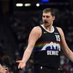 Mar 17, 2026; Denver, Colorado, USA; Denver Nuggets center Nikola Jokic (15) questions an official after a foul during the first half against the Philadelphia 76ers at Ball Arena.