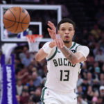 Mar 19, 2026; Salt Lake City, Utah, USA; Milwaukee Bucks guard Ryan Rollins (13) makes a pass against the Utah Jazz during the first half at Delta Center. Mandatory Credit: Rob Gray-Imagn Images