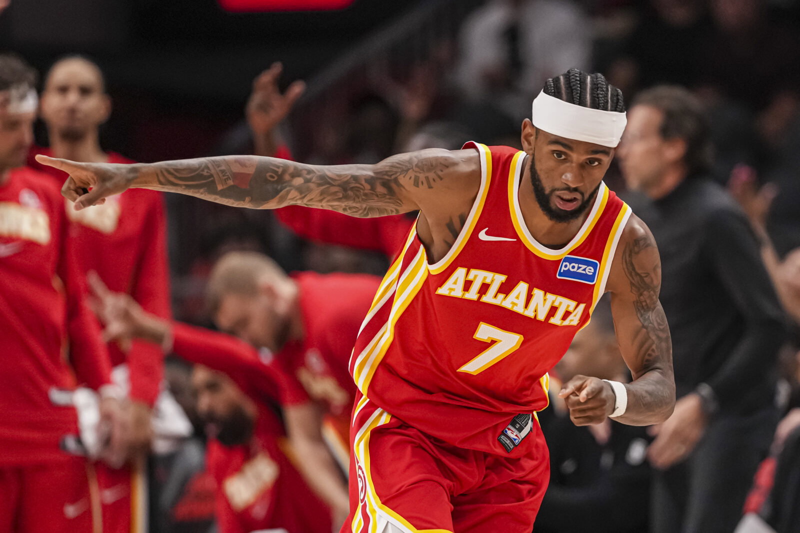 Mar 23, 2026; Atlanta, Georgia, USA; Atlanta Hawks guard Nickeil Alexander-Walker (7) reacts after making a three point basket against the Memphis Grizzlies during the first half at State Farm Arena. Mandatory Credit: Dale Zanine-Imagn Images