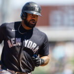 Mar 24, 2026; Mesa, Arizona, USA; New York Yankees outfielder Jasson Dominguez rounds the bases after hitting a home run against the Chicago Cubs during spring training at Sloan Park. Mandatory Credit: