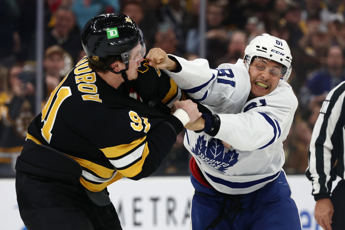 Mar 24, 2026; Boston, Massachusetts, USA; Toronto Maple Leafs center Dakota Joshua (81) fights with Boston Bruins defenseman Nikita Zadorov (91) during the third period at TD Garden. Mandatory Credit: Winslow Townson-Imagn Images