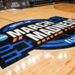 Mar 26, 2026; Fort Worth, TX, USA; A detailed view of the March Madness Sweet 16 Elite 8 center court logo during a practice session press conference ahead ofÊthe women's 2026 NCAA Tournament at Dickies Arena. Mandatory Credit: Chris Jones-Imagn Images