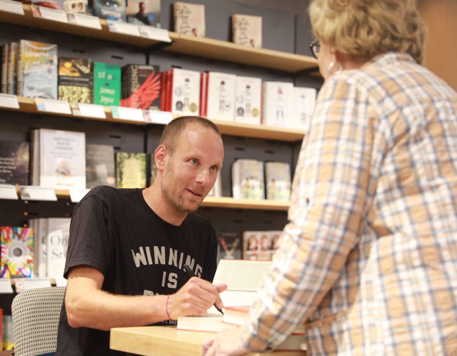 New York Times best-selling author and Mahopac alumnus Jeff Pearlman signs his latest book on the USFL at Barnes & Noble in Scarsdale Sept.12, 2018. Jeff Pearlman