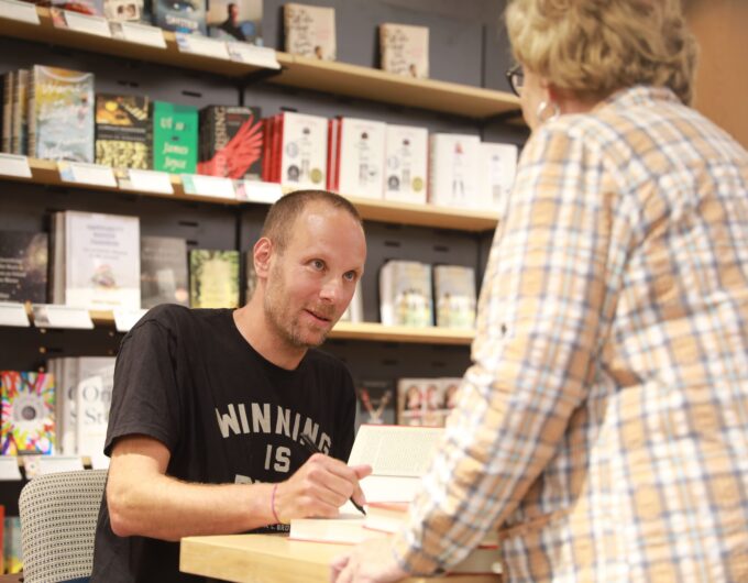 New York Times best-selling author and Mahopac alumnus Jeff Pearlman signs his latest book on the USFL at Barnes & Noble in Scarsdale Sept.12, 2018. Jeff Pearlman