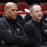 Apr 22, 2022; Chicago, Illinois, USA; Chicago Bulls executive vice president of basketball operations Arturas Karnisovas (right) talks with general manager Marc Eversley (left) before game three of the first round for the 2022 NBA playoffs against the Milwaukee Bucks at United Center. Mandatory Credit: Kamil Krzaczynski-USA TODAY Sports