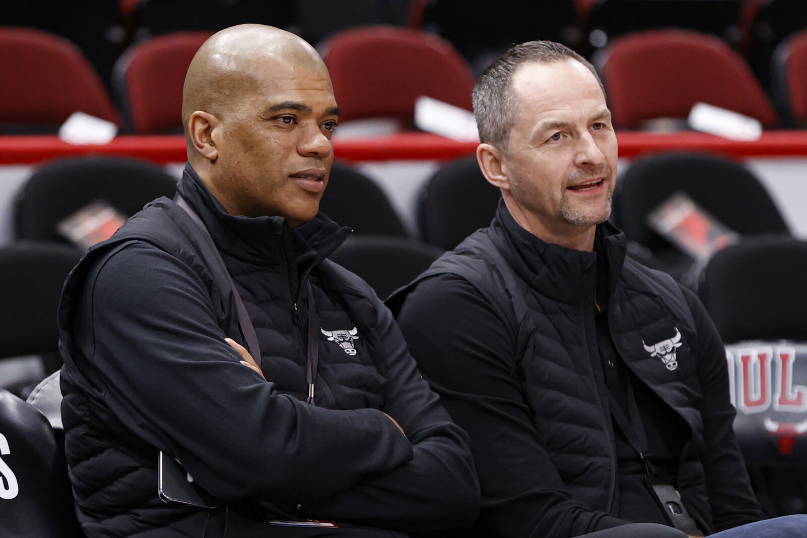 Apr 22, 2022; Chicago, Illinois, USA; Chicago Bulls executive vice president of basketball operations Arturas Karnisovas (right) talks with general manager Marc Eversley (left) before game three of the first round for the 2022 NBA playoffs against the Milwaukee Bucks at United Center. Mandatory Credit: Kamil Krzaczynski-USA TODAY Sports