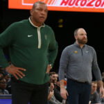 Feb 15, 2024; Memphis, Tennessee, USA; Milwaukee Bucks head coach Doc Rivers (left) and Memphis Grizzlies head coach Taylor Jenkins (right) watch during the second half at FedExForum. Mandatory Credit: Petre Thomas-USA TODAY Sports