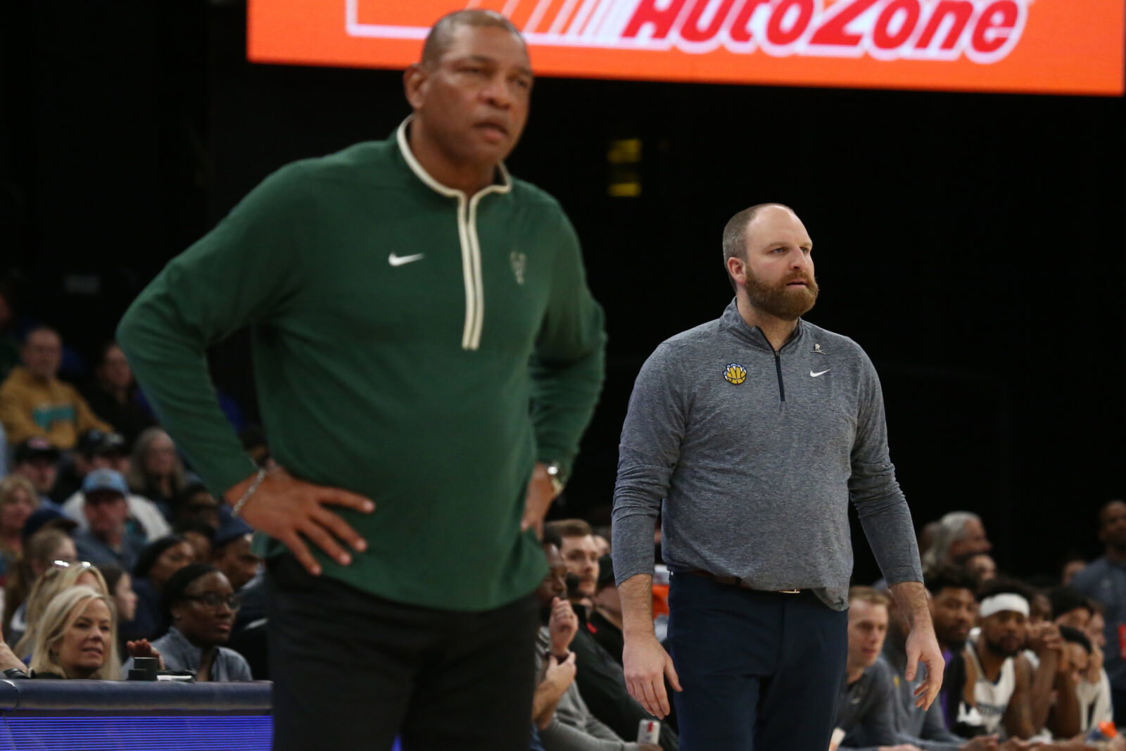Feb 15, 2024; Memphis, Tennessee, USA; Milwaukee Bucks head coach Doc Rivers (left) and Memphis Grizzlies head coach Taylor Jenkins (right) watch during the second half at FedExForum. Mandatory Credit: Petre Thomas-USA TODAY Sports