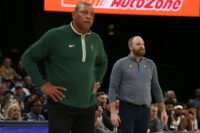 Feb 15, 2024; Memphis, Tennessee, USA; Milwaukee Bucks head coach Doc Rivers (left) and Memphis Grizzlies head coach Taylor Jenkins (right) watch during the second half at FedExForum. Mandatory Credit: Petre Thomas-USA TODAY Sports