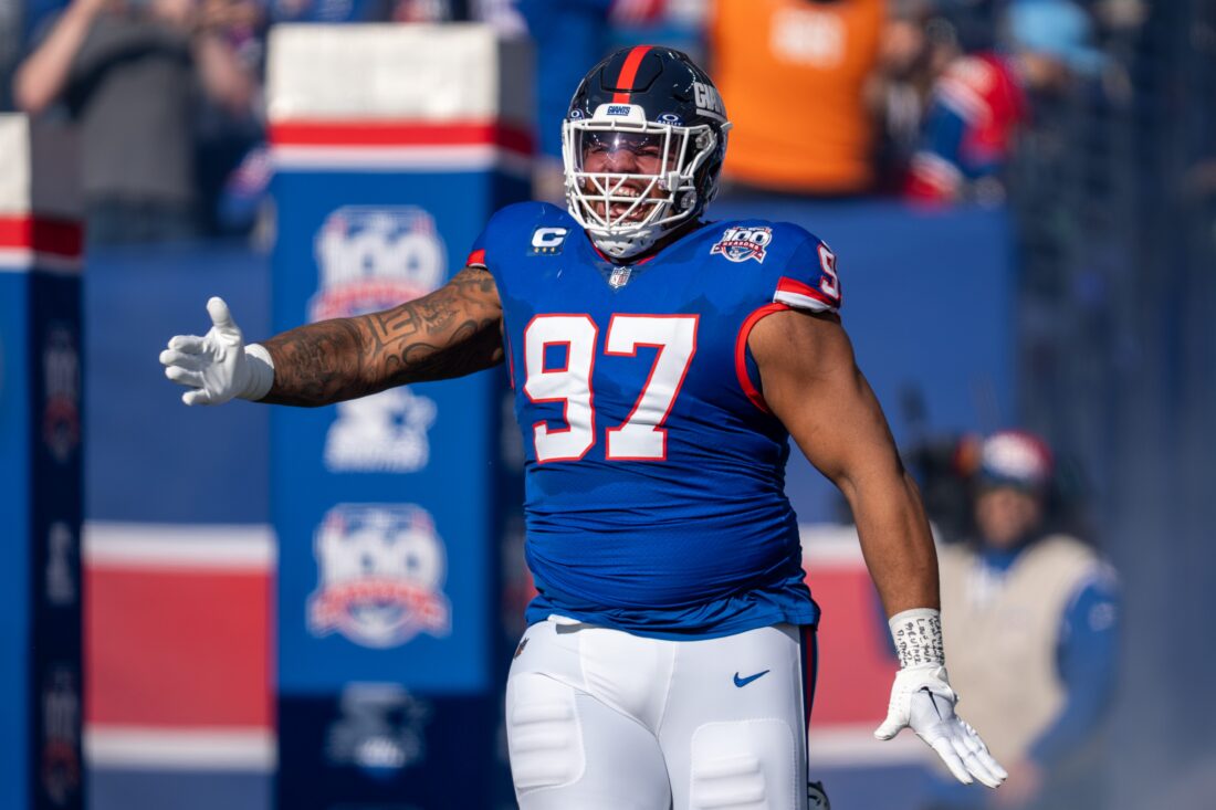New York Giants defensive tackle Dexter Lawrence II (97) runs out of the tunnel prior to the start of the game between the New York Giants and the Washington Commanders at MetLife Stadium in East Rutherford on Sunday, Nov. 3, 2024.