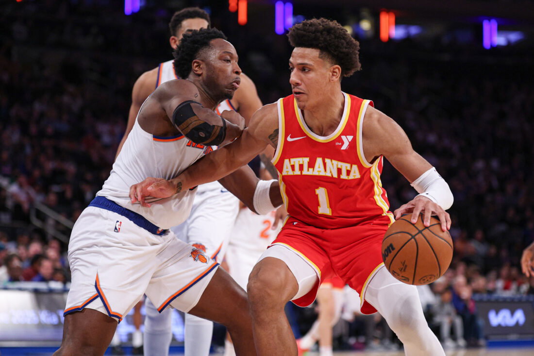 Jan 20, 2025; New York, New York, USA; Atlanta Hawks forward Jalen Johnson (1) is guarded by New York Knicks forward OG Anunoby (8) during the second half at Madison Square Garden. Mandatory Credit: Vincent Carchietta-Imagn Images