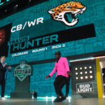 Apr 24, 2025; Green Bay, WI, USA; Colorado Buffaloes wide receiver Travis Hunter is selected by the Jacksonville Jaguars as the number two pick in the first round of the 2025 NFL Draft at Lambeau Field. Mandatory Credit: Kirby Lee-Imagn Images