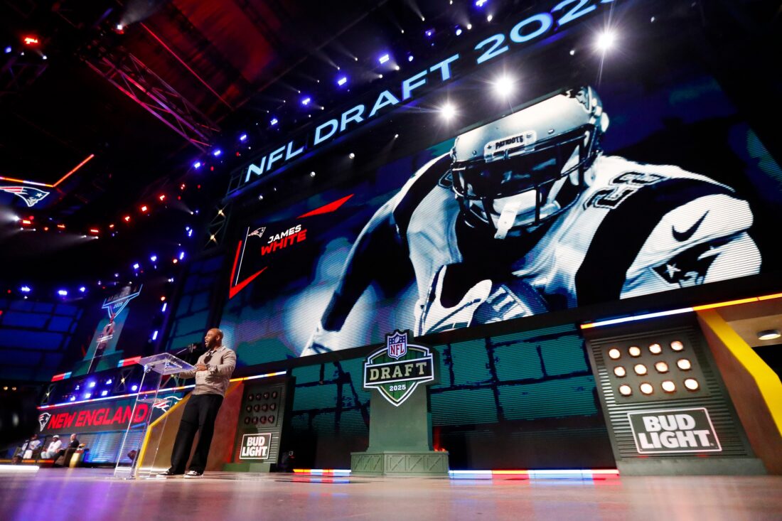 Former New England Patriots running back James White announces the team’s selection with the 95th overall pick during the round of the 2025 NFL Draft on Friday, April 25, 2025, at Lambeau Field in Green Bay, Wisconsin. The draft runs through April 26. Tork Mason/USA TODAY NETWORK-Wisconsin