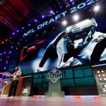 Former New England Patriots running back James White announces the team’s selection with the 95th overall pick during the round of the 2025 NFL Draft on Friday, April 25, 2025, at Lambeau Field in Green Bay, Wisconsin. The draft runs through April 26. Tork Mason/USA TODAY NETWORK-Wisconsin