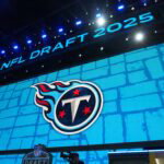 Apr 24, 2025; Green Bay, WI, USA; The Tennessee Titans logo is projected on the video board during the NFL Draft at Lambeau Field. Mandatory Credit: Kirby Lee-Imagn Images