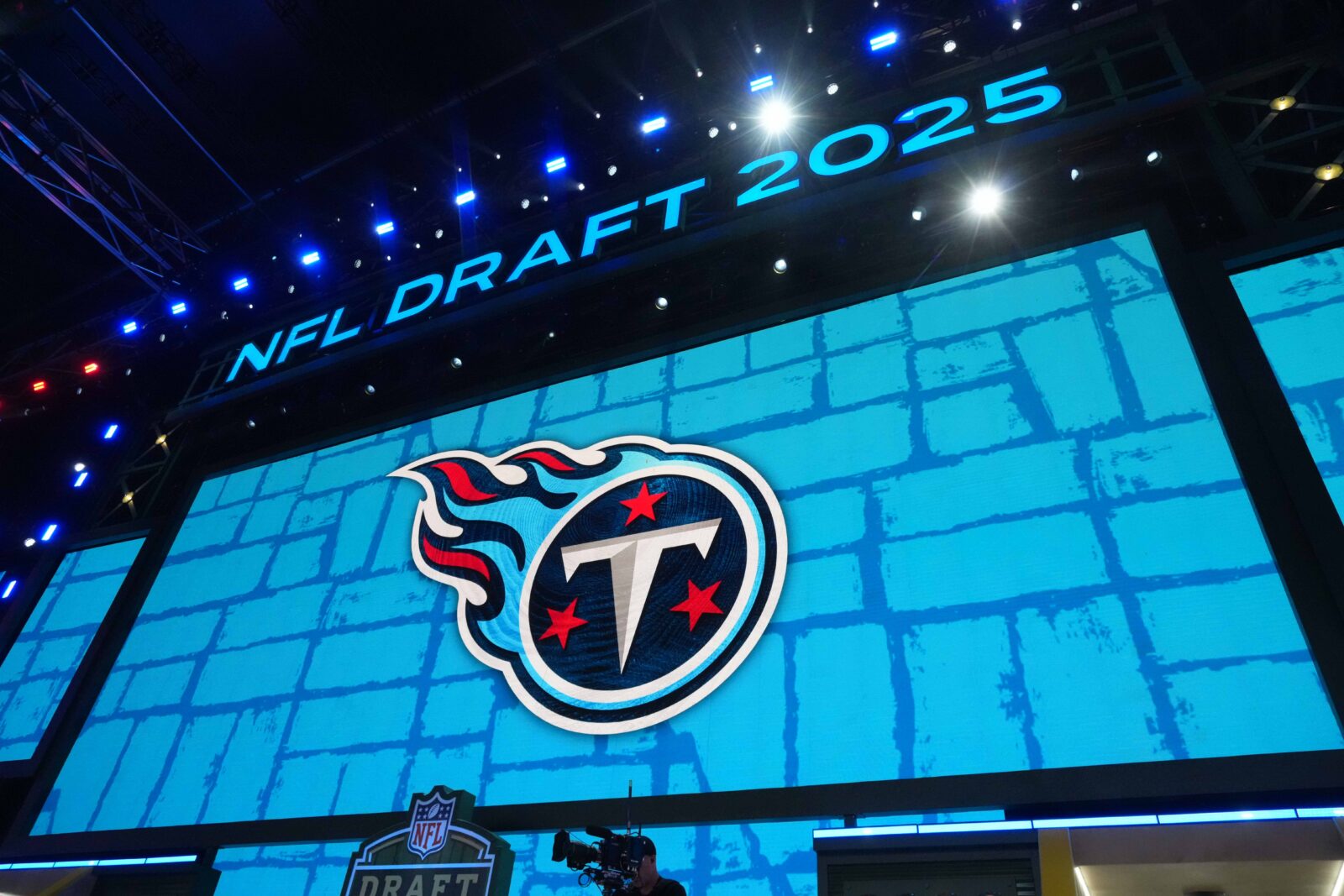 Apr 24, 2025; Green Bay, WI, USA; The Tennessee Titans logo is projected on the video board during the NFL Draft at Lambeau Field. Mandatory Credit: Kirby Lee-Imagn Images