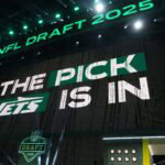 Apr 24, 2025; Green Bay, WI, USA; The New York Jets logo is projected on the video board during the NFL Draft at Lambeau Field. Mandatory Credit: Kirby Lee-Imagn Images