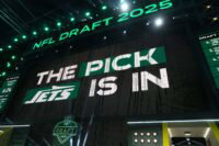 Apr 24, 2025; Green Bay, WI, USA; The New York Jets logo is projected on the video board during the NFL Draft at Lambeau Field. Mandatory Credit: Kirby Lee-Imagn Images