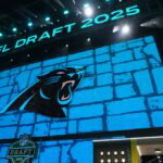 Apr 24, 2025; Green Bay, WI, USA; The Carolina Panthers logo is projected on the video board during the NFL Draft at Lambeau Field. Mandatory Credit: Kirby Lee-Imagn Images