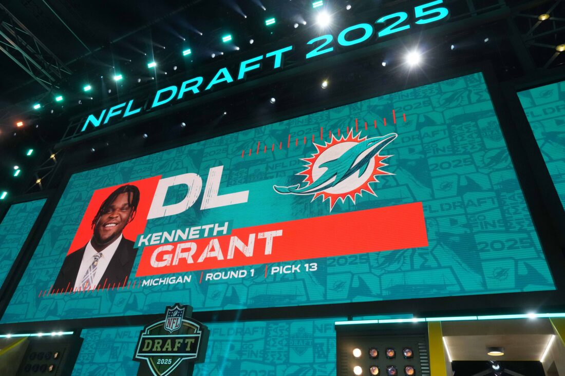 Apr 24, 2025; Green Bay, WI, USA; Michigan Wolverines defensive lineman Kenneth Grant is selected as the No. 13 pick by the Miami Dolphins during the NFL Draft at Lambeau Field. Mandatory Credit: Kirby Lee-Imagn Images