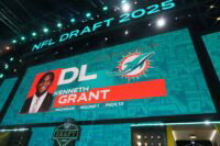 Apr 24, 2025; Green Bay, WI, USA; Michigan Wolverines defensive lineman Kenneth Grant is selected as the No. 13 pick by the Miami Dolphins during the NFL Draft at Lambeau Field. Mandatory Credit: Kirby Lee-Imagn Images