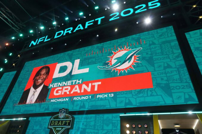 Apr 24, 2025; Green Bay, WI, USA; Michigan Wolverines defensive lineman Kenneth Grant is selected as the No. 13 pick by the Miami Dolphins during the NFL Draft at Lambeau Field. Mandatory Credit: Kirby Lee-Imagn Images