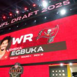 Apr 24, 2025; Green Bay, WI, USA; Ohio State Buckeyes receiver Emeka Egbuka is selected as the No. 19 pick by the Tampa Bay Buccaneers during the NFL Draft at Lambeau Field. Mandatory Credit: Kirby Lee-Imagn Images