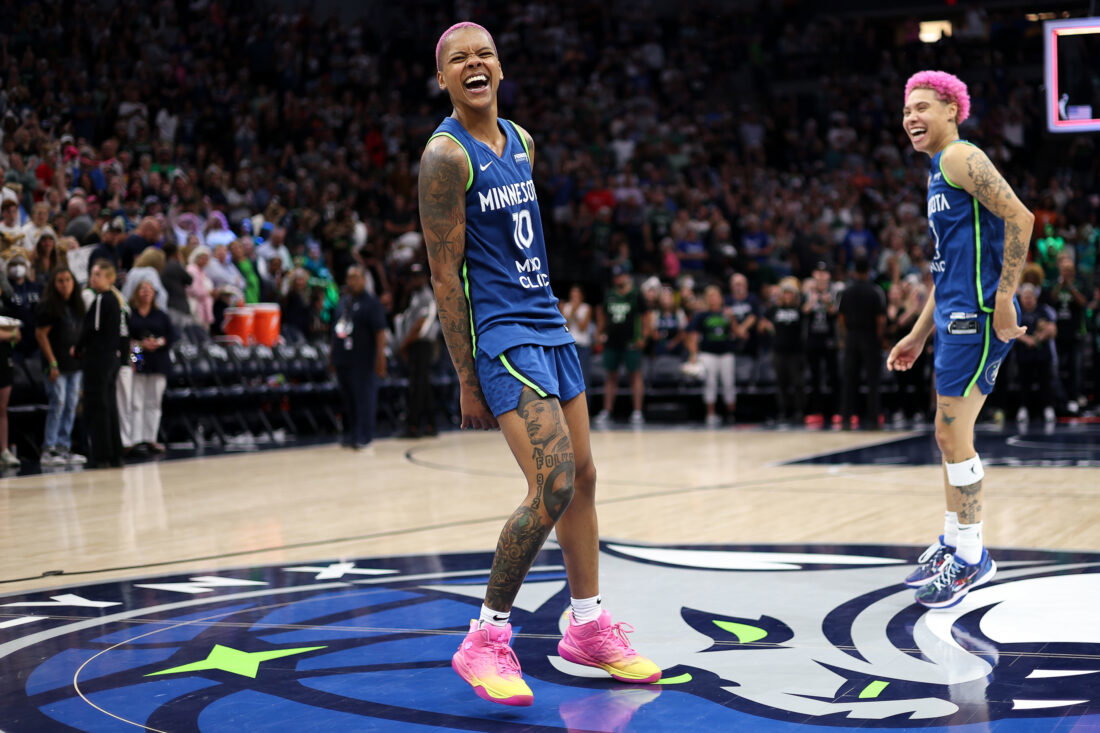 Aug 16, 2025; Minneapolis, Minnesota, USA; Minnesota Lynx guard Courtney Williams (10) and guard Natisha Hiedeman (2) celebrate their teams win against the New York Liberty after the game at Target Center. Mandatory Credit: Matt Krohn-Imagn Images
