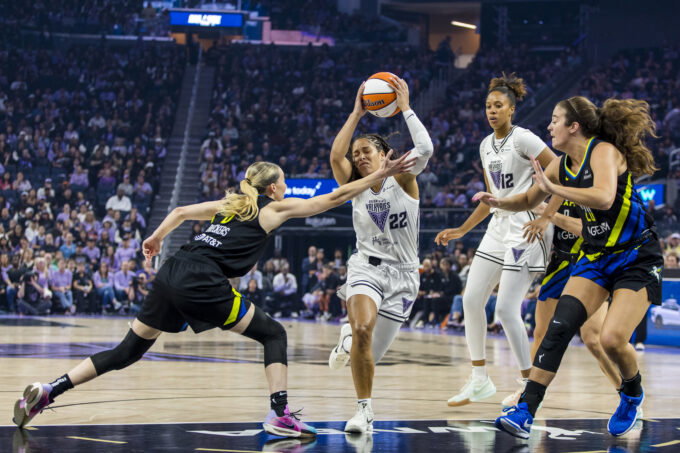 Sep 4, 2025; San Francisco, California, USA; Dallas Wings guard Paige Bueckers (5) defends Golden State Valkyries guard Veronica Burton (22) during the first quarter at Chase Center. Mandatory Credit: John Hefti-Imagn Images