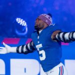 New York Giants linebacker Kayvon Thibodeaux (5) runs out of the tunnel during a Thursday Night Football game between the New York Giants and the Philadelphia Eagles at MetLife Stadium in East Rutherford on Oct. 9, 2025.