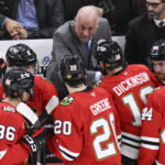 Oct 17, 2025; Chicago, Illinois, USA; Chicago Blackhawks head coach Jeff Blashill talks with the team during the third period against the Vancouver Canucks at the United Center. Mandatory Credit: Matt Marton-Imagn Images