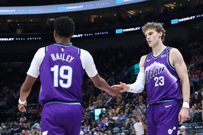 Nov 13, 2025; Salt Lake City, Utah, USA; Utah Jazz forward Lauri Markkanen (23) and guard Ace Bailey (19) react to a play against the Atlanta Hawks during the second half at Delta Center. Mandatory Credit: Rob Gray-Imagn Images