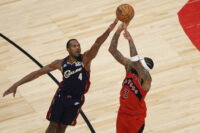 Nov 24, 2025; Toronto, Ontario, CAN; Cleveland Cavaliers forward Evan Mobley (4) tries to block a shot by Toronto Raptors forward Brandon Ingram (3) during the second half at Scotiabank Arena. Mandatory Credit: John E. Sokolowski-Imagn Images