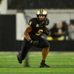 Nov 22, 2025; Nashville, Tennessee, USA; Vanderbilt Commodores tight end Eli Stowers (9) runs with the ball after a made catch against the Kentucky Wildcats during the second half at FirstBank Stadium. Mandatory Credit: Steve Roberts-Imagn Images
